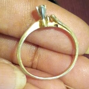 14K solid yellow gold marquise-cut diamond engagement ring.